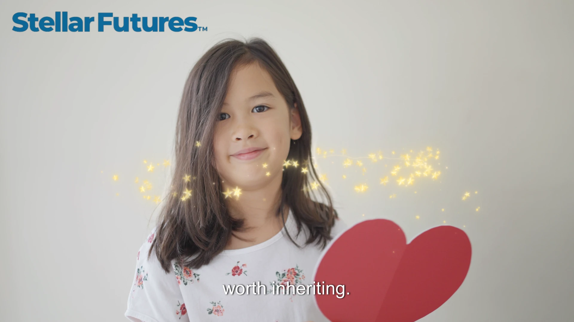 Stellar Futures film thumbnail featuring a child holding a heart